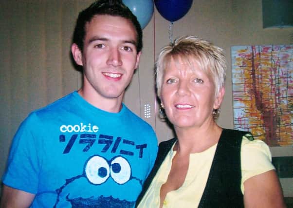 Car crash victim Lee Wilby from Lupset, pictured here with his mum, Karen Wilkinson.
w7218a909
