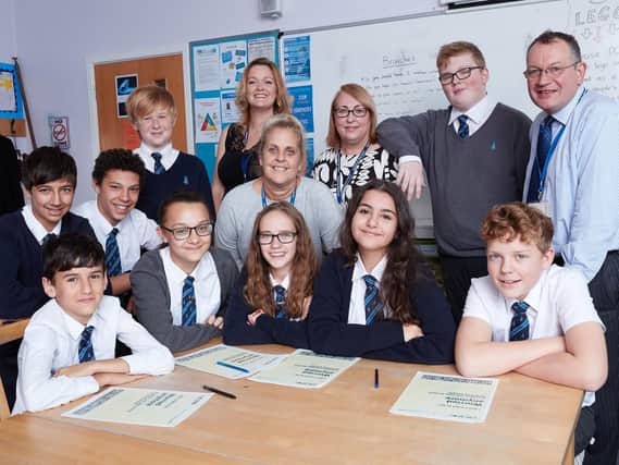 Teachers Emily Del-Grande, Julie Lord, Karen Wild and Tudor Griffiths with pupils from Kettlethorpe High School