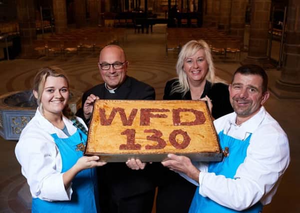 Nigel Hofmann and his daughter Emily have made a WFD Pie, pictured in Wakefield Cathedral with the Dean of Wakefield Simon Cowling and Elizabeth Murphy (BID Manager)
