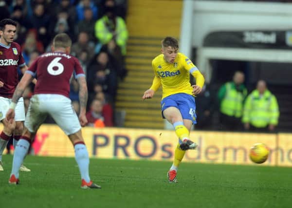Jack Clarke gets in the shot that led to his first senior goal for Leeds United at Aston Villa. Picture: Tony Johnson.