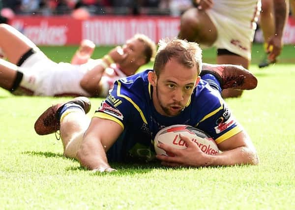 George King touches down for Warrington Wolves in the Challenge Cup final.
