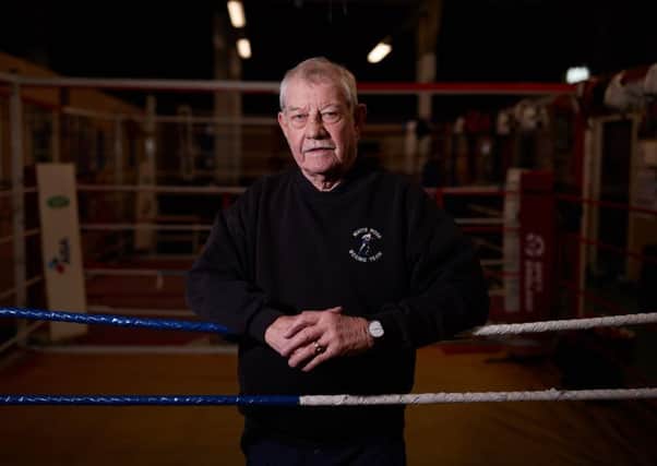 Coach: John Hall at the White Rose Boxing Club on Denby Dale Road.