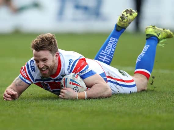 Danny Kirmond shows his delight as he crosses for the first try of the day during his testimonial. PIC: John Clifton.