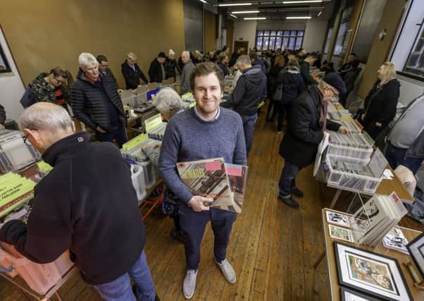 Picture by Allan McKenzie/YWNG - 19/01/19 - Press - Vinyl Record Fayre, Elizabethan House, Wakefield,  England - Jason Firth with vinyl collectors at the fayre.
