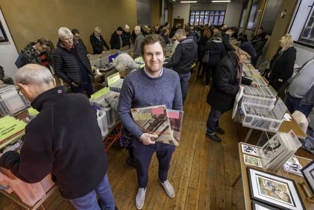 Picture by Allan McKenzie/YWNG - 19/01/19 - Press - Vinyl Record Fayre, Elizabethan House, Wakefield,  England - Jason Firth with vinyl collectors at the fayre.