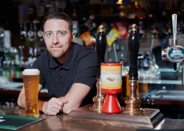 The Horse and Jockey pub in Altofts will be giving away free meals to OAPâ¬"s. Pictured is bar manager Simon Dean