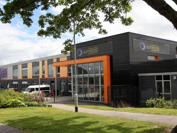 A worried parent says there are fights being filmed and shared among pupils at Outwood Grange.