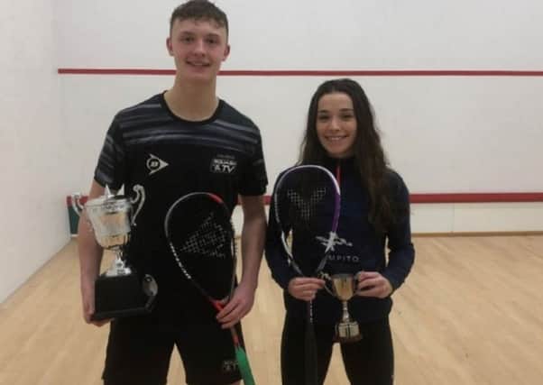 Sam Todd pictured with Jasmine Hutton after they both triumphed in the British U23 Squash Championships at Roehampton.