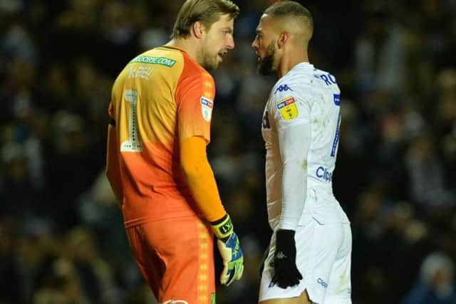 Norwich goalkeeper Tim Krul squares up to Leeds United's Kemar Roofe. Picture: Bruce Rollinson
