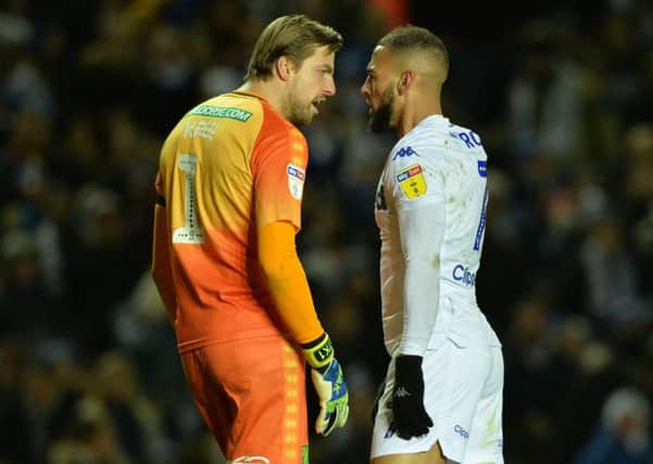 Norwich goalkeeper Tim Krul squares up to Leeds United's Kemar Roofe. Picture: Bruce Rollinson
