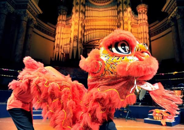 260119    The traditional Lion Dance  on stage at Leeds Town Hall  part of the Leeds Chinese Community School  'Rhythm of Spring Chinese New Year' celebrations.