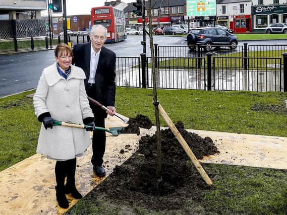 Complete: Coun Peter Box and Coun Kim Groves plant a tree on Kirkgate roundabout.