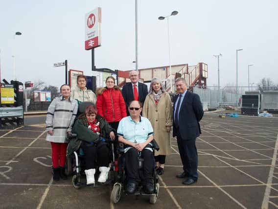 At the front: Damon Nicholson and his cousin Stephanie Downes are unable to use one of Pontefract Monkhill's platforms because there is no step-free access. 
At the back from left to right are Damon's sister Mary Nicholson, Stephanie's sister-in-law Susan Smith, Damon's father's partner Karina Nicholson and Pontefract councillors Clive Tennant, Pat Garbutt and David Jones.