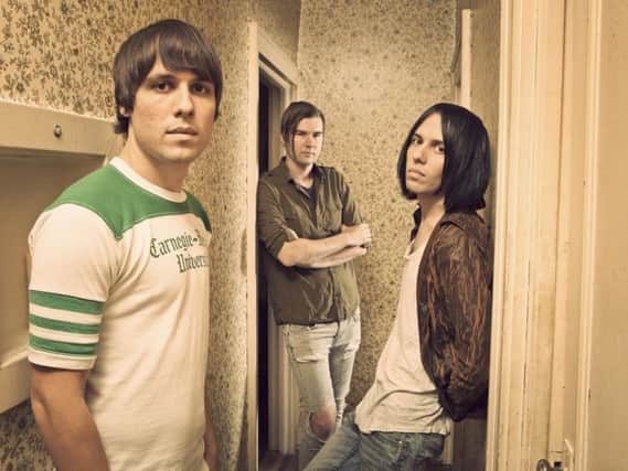The Cribs have agreed to put their name to a Wakefield football team shirt.