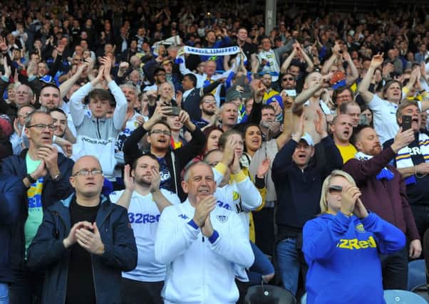 Leeds United fans applaud the team off at the end of the Millwall game.