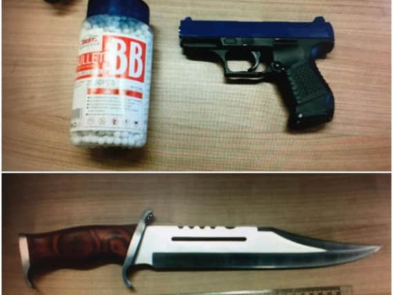 The BB gun and knife were found on the driver.