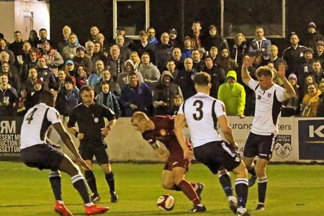 Adam Priestley takes on the Guiseley defence at a packed-out Ingfield. PIC: John Hirst.