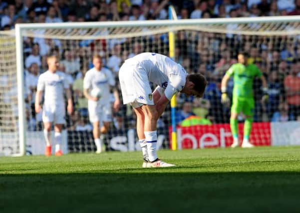 Dejected Patrick Bamford at the end of Leeds United's 2-1 defeat to Wigan. Picture: Simon Hulme