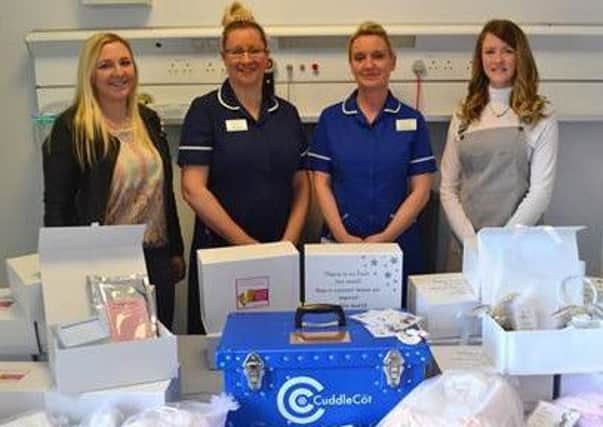 Nicola Callaghan (right) with friend Shelley Lee (left), bereavement support midwife Helen Holland, and deputy delivery suite manager Naomi Pollock.