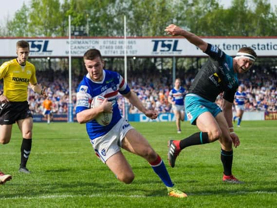Max Jowitt goes over for a try against Leeds Rhinos. PIC: James Heaton.