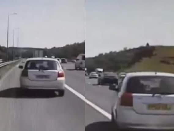 The hair-raising footage shows a driver attempting to rejoin the M62 motorway.