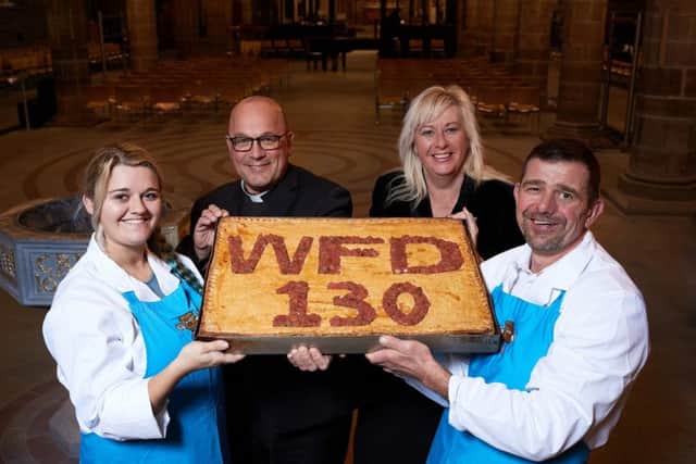 Nigel Hofmann and his daughter Emily made a WFD Pie, pictured in Wakefield Cathedral with the Dean of Wakefield Simon Cowling and Elizabeth Murphy (BID Manager)