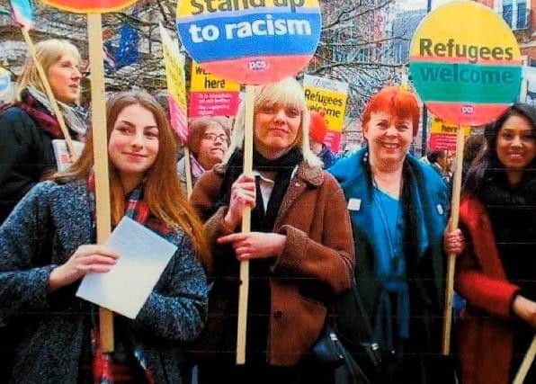 Emma taking part in an anti-racism demonstration.
