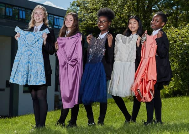 Support: Pupils Jaymee-Leigh, Molly, Angell, Alyssa and Danielle with some of the donated dresses.