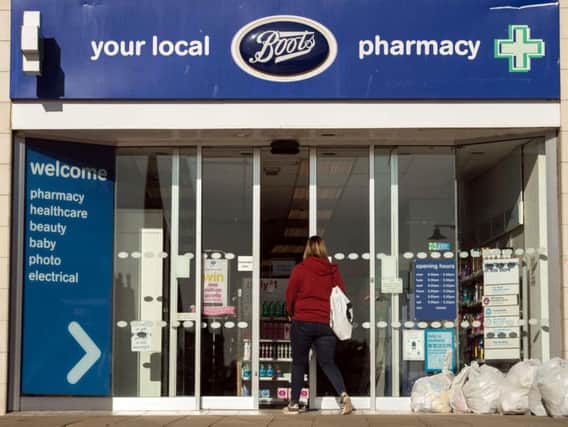 Retailer Boots is to review the future of more than 200 branches. Photo: OLI SCARFF/AFP/Getty Images