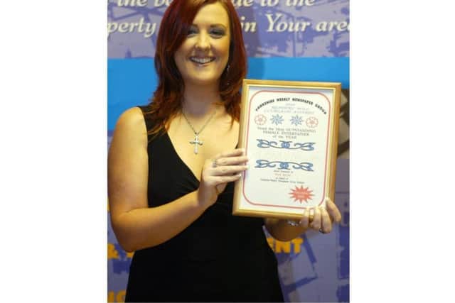 Britain's Got Talent finalist Siobhan Phillips is seen with the Yorkshire Weekly Newspaper Group's Outstanding Female Entertainer of the Year award in 2004.