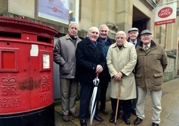 Pictured is Sir Bill O'Brien - secretary of Pontefract Town Centre Partnership, with fellow members.