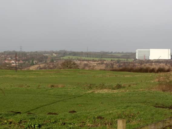 Plans for a new depot, which would be occupied by a beer and wine makers, is going back before a council committee despite members saying they were minded to refuse the proposal in February.