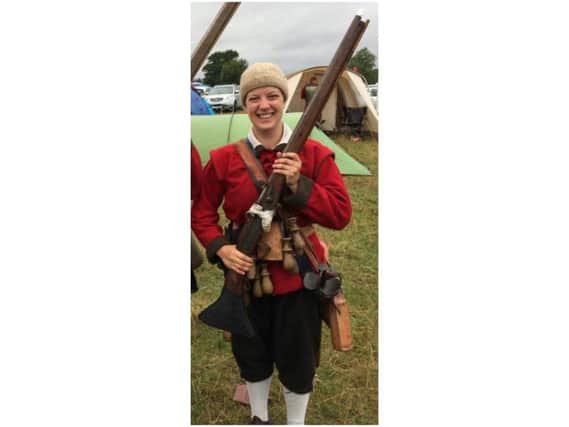 Gill Birtles pictured with her replica musket, which was stolen from her car last weekend.