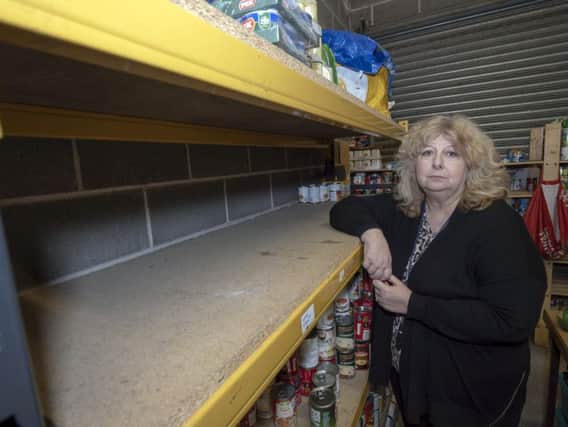 Angela Jones, volunteer coordinator at St Catherine's Church Centre. The food bank's stocks have fallen to "worryingly low" levels.