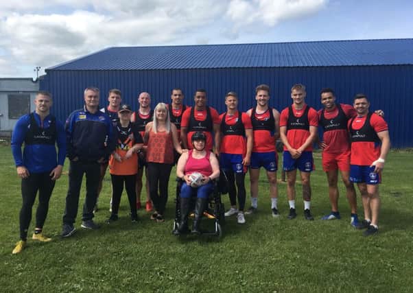 Two huge Rugby fans with learning disabilities were treated to a behind the scenes experience at Wakefield Trinity.