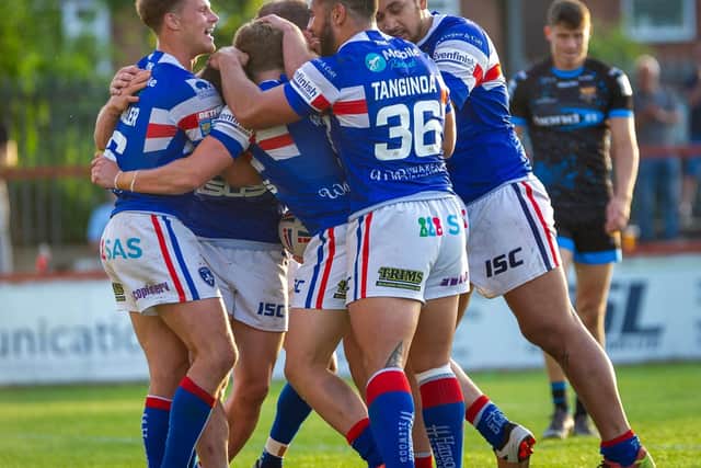 Wakefield Trinity celebrate a first win in six games. PIC: James Heaton.