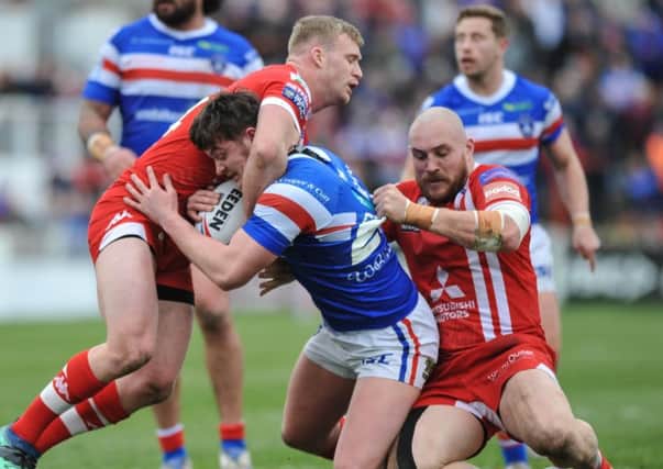 Wakefield Trinity's Jordan Crowther in no-nonsense action against Salford Red Devils in March. Picture: Dean Williams/RugbyPixUK