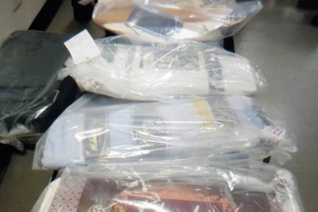Investigators found 6kg heroin concealed in a suitcase packed with fabric and childrens clothing. (NCA)