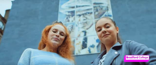 Rebecca Mayson (right) with fellow student Natasha Hudson at David Hockney mural