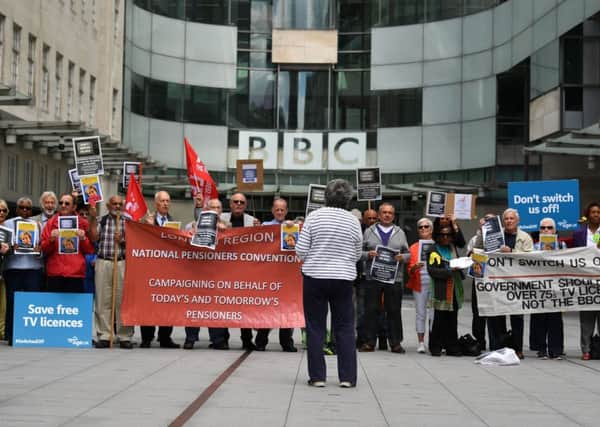 Senior citizens protest outside the BBC studios in London on June 21, 2019 against the end of government funding for free TV licenses for the over 75s. - Funding the free licences is due to be transferred from the Government to the BBC in 2019 as part of an agreement hammered out in 2015. The BBC has said that funding the universal scheme would mean the closure of BBC Two, BBC Four, the BBC News Channel, the BBC Scotland channel, Radio 5 Live, and a number of local radio stations. (Photo by Ben STANSALL / AFP)        (Photo credit should read BEN STANSALL/AFP/Getty Images)