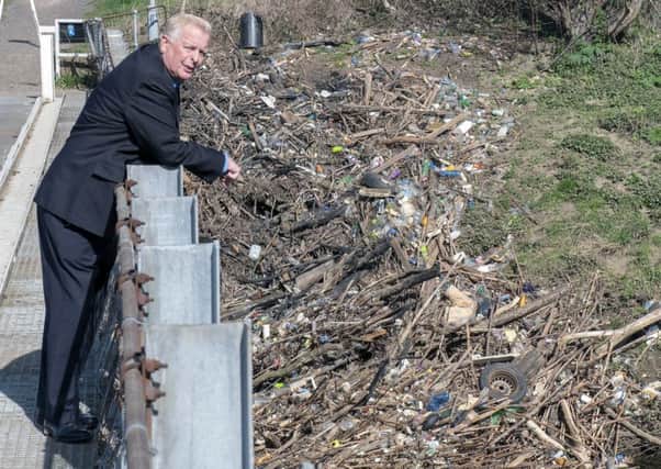 Environmental campaigner: Paul Dainton observes rubbish at Stanley Ferry.
