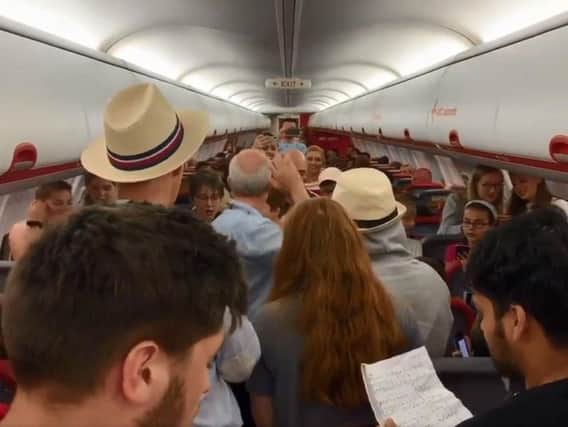 Passengers on a flight to Manchester were surprised today by an impromptu cruising-altitude recital  performed by members of the Wakefield Cathedral Choir.
