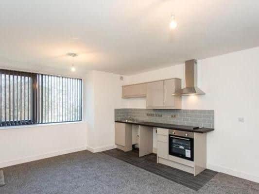 Queen Street, Wakefield. For sale by conditional auction, with a starting bid of 30,000. Newly refurbished first floor flat with an open plan living space.