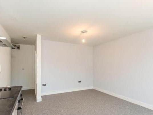 Queen Street, Wakefield. For sale by conditional auction, with a starting bid of 30,000. Newly refurbished first floor flat with an open plan living space.