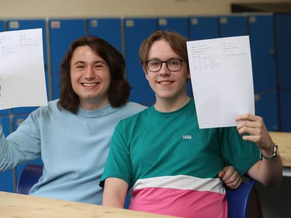 Lewis Jones andJoseph Basford with their A-Level Results at Queen Elizabeth Grammar School.