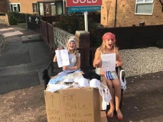 An innovative pair of cheeky sisters tried to fund their house move across the country to Castleford - by having a street sale of their mothers used underwear.