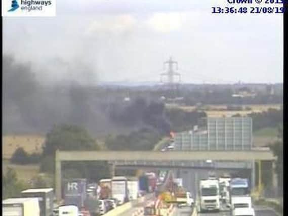 A vehicle fire has caused congestion on the M62 near Ferrybridge today. Photo: Highways England