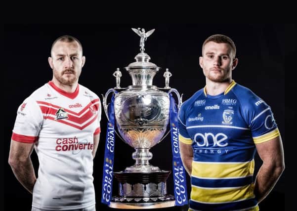St Helens' James Roby and Warrington Wolves' Jack Hughes pose with the The Rugby League Challenge Cup Trophy. Picture by SWpix.com