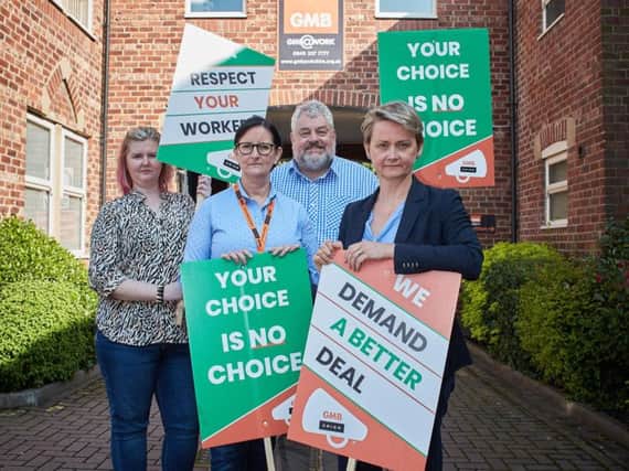Union bosses and Pontefract and Castleford MP Yvette Cooper are backing Asda workers who are being forced to sign new contracts which they says clamps down on breaks and working hours.
