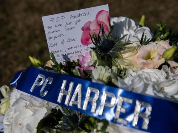 "Let us still our busy hearts and minds as we remember our colleague." (Getty Images)